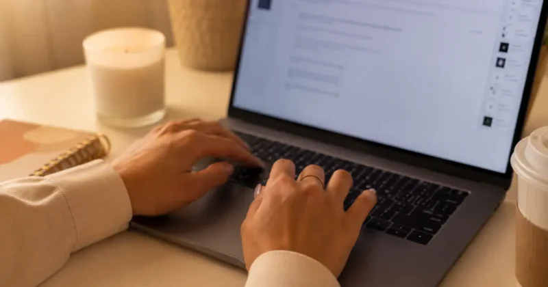 Creator typing a social media caption using Canva Magic Write inside the design editor